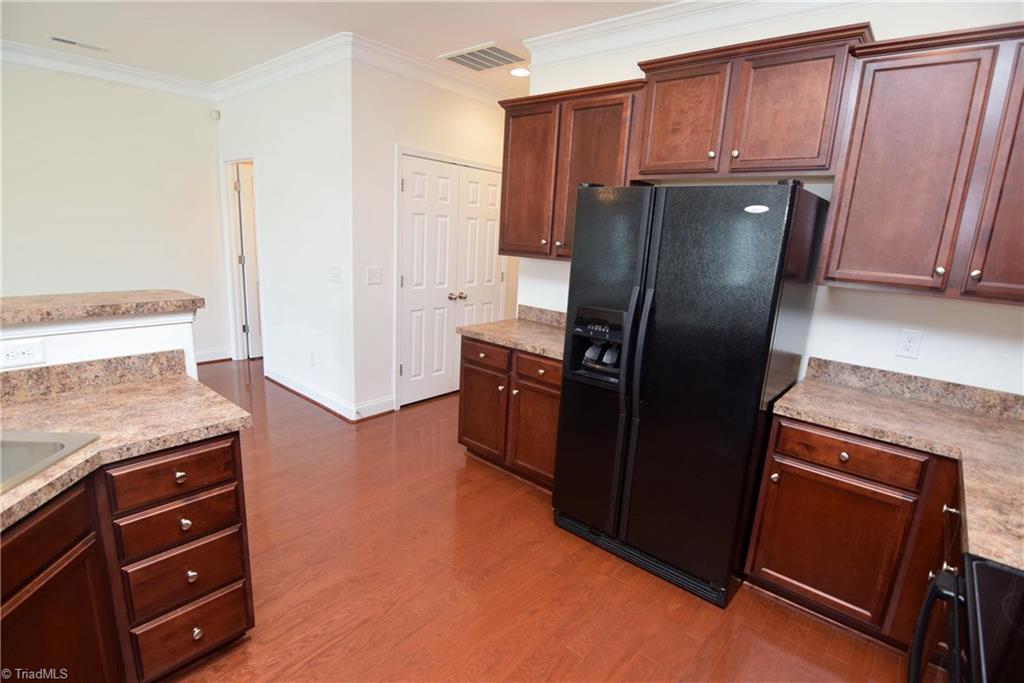 3476 Basalt Court High Point, NC 27265 - Photo 16 of 30 The kitchen also has a large pantry! There is a half bath on the main level.