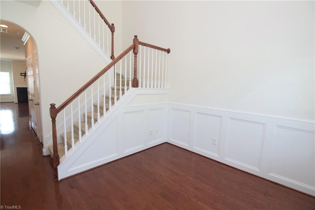 3476 Basalt Court High Point, NC 27265 - Photo 4 of 30 Beautiful hardwood floors, chair rail mouldings, and arched doorway are just some of the details that can be found in this home.