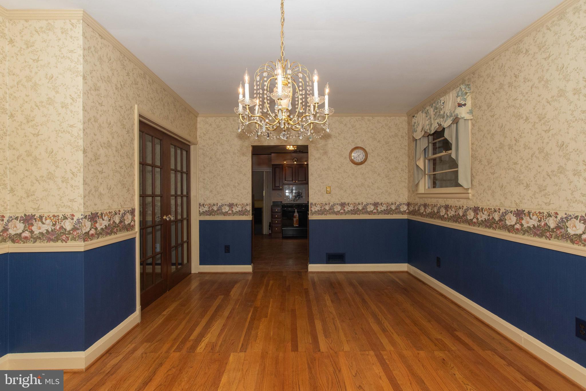 804 Stone Barn Road Towson, MD 21286 - Photo 9 of 40 Formal Dining with chandelier
