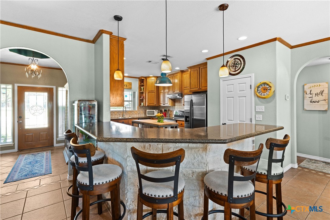 690 A County Road 4707 Kempner, TX 76539 - Photo 9 of 39 a dining area with furniture and a table