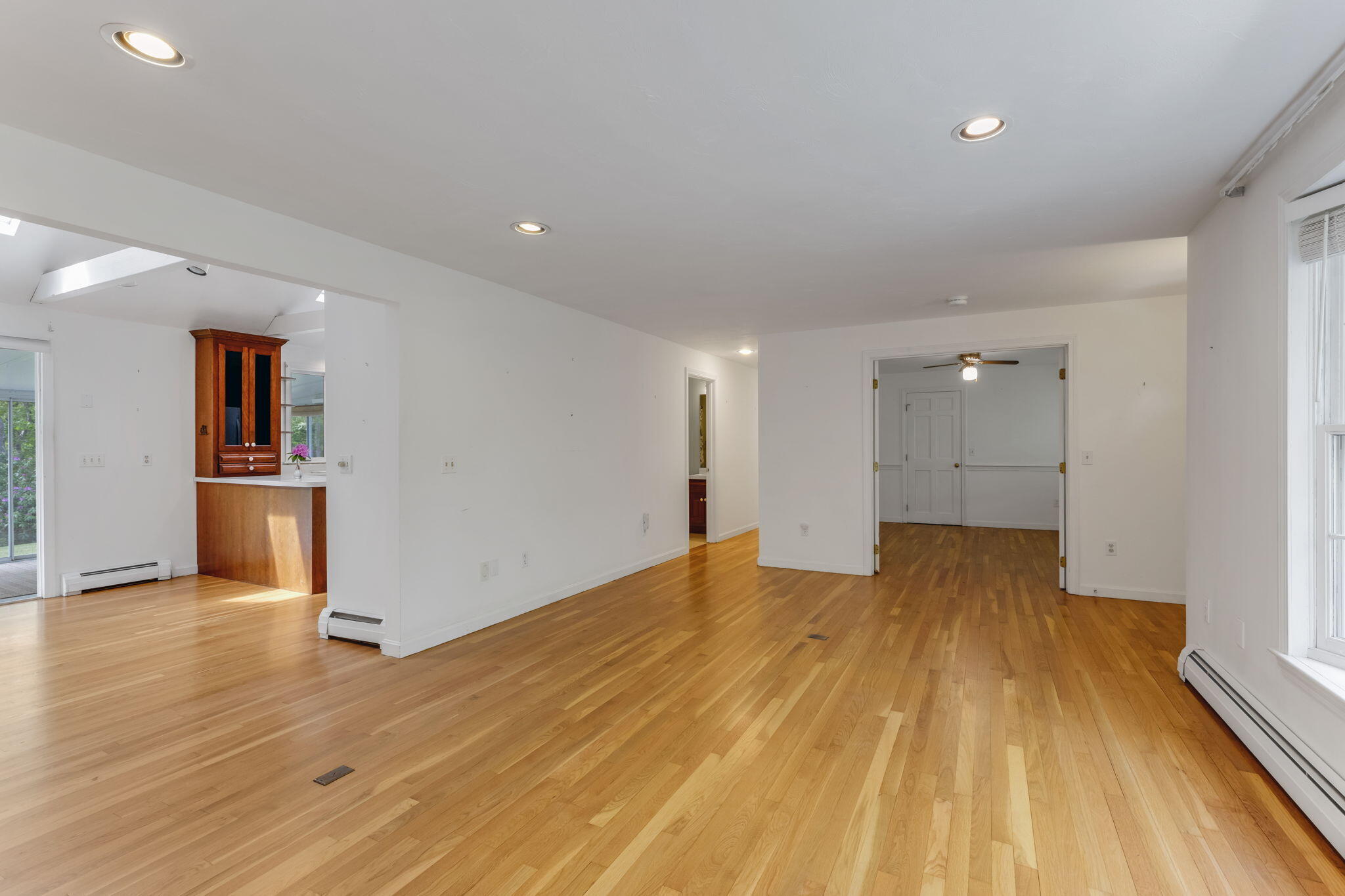 100 Potonumecot Road Chatham, MA 02633 - Photo 7 of 40 a view of empty room with wooden floor