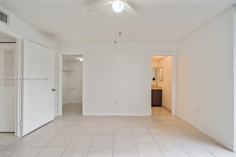 8540 Southwest 133rd Avenue Road, Unit 208 Miami, FL 33183 - Photo 14 of 18 an empty room with a bathroom