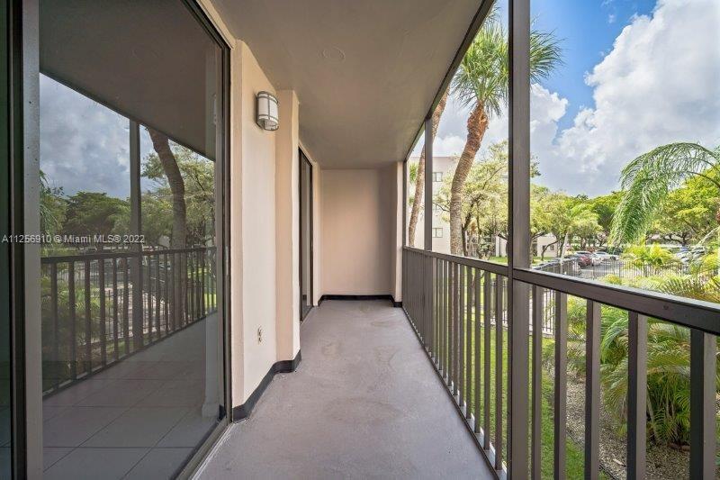 8540 Southwest 133rd Avenue Road, Unit 208 Miami, FL 33183 - Photo 4 of 18 a view of a city from a balcony