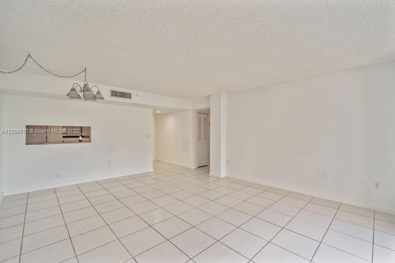8540 Southwest 133rd Avenue Road, Unit 208 Miami, FL 33183 - Photo 7 of 18 a view of an empty room