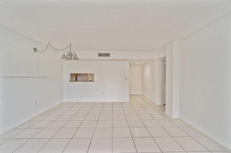 8540 Southwest 133rd Avenue Road, Unit 208 Miami, FL 33183 - Photo 8 of 18 a view of an empty room