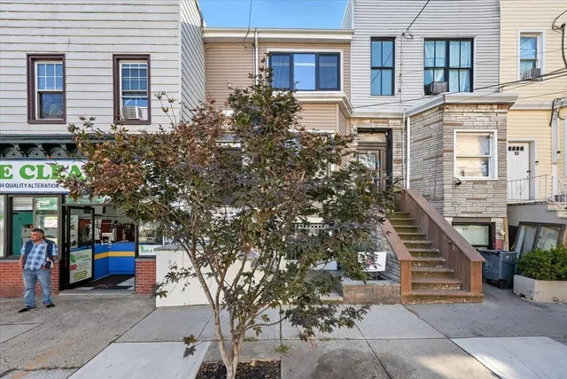 a picture of a bathroom with a shower