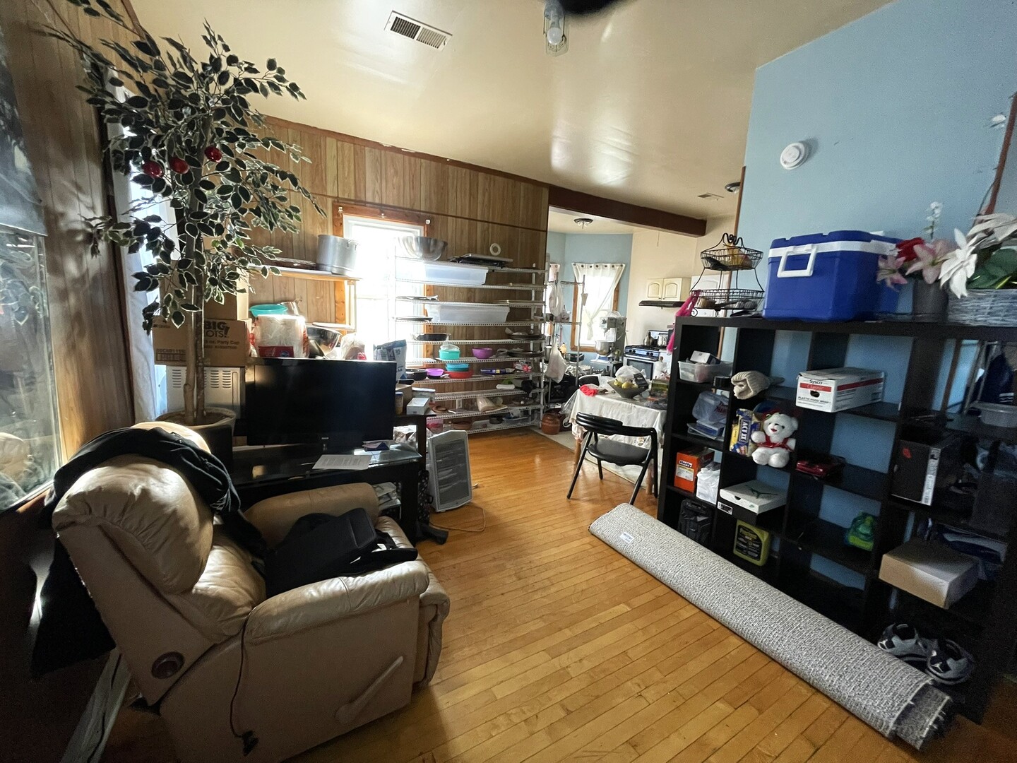 347 Pine Street Joliet, IL 60435 - Photo 23 of 38 a living room with lots of furniture and a flat screen tv
