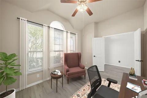 a living room with furniture and a window