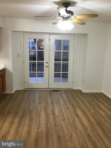 a kitchen with stainless steel appliances a stove a sink and a microwave