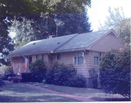 405 Marrett Road Lexington, MA 02421 - Photo 1 of 1 a view of a house with a yard