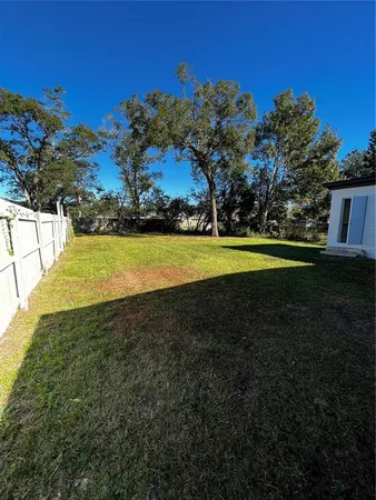 a view of big yard with a big yard