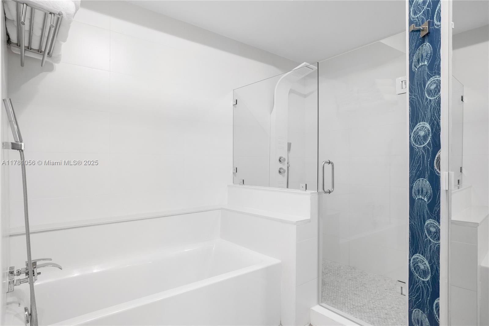 1 Century Lane, Unit 309 Miami Beach, FL 33139 - Photo 14 of 18 a bathroom with a bathtub