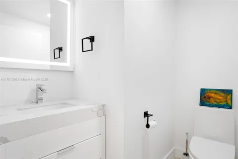 a bathroom with a sink and a toilet