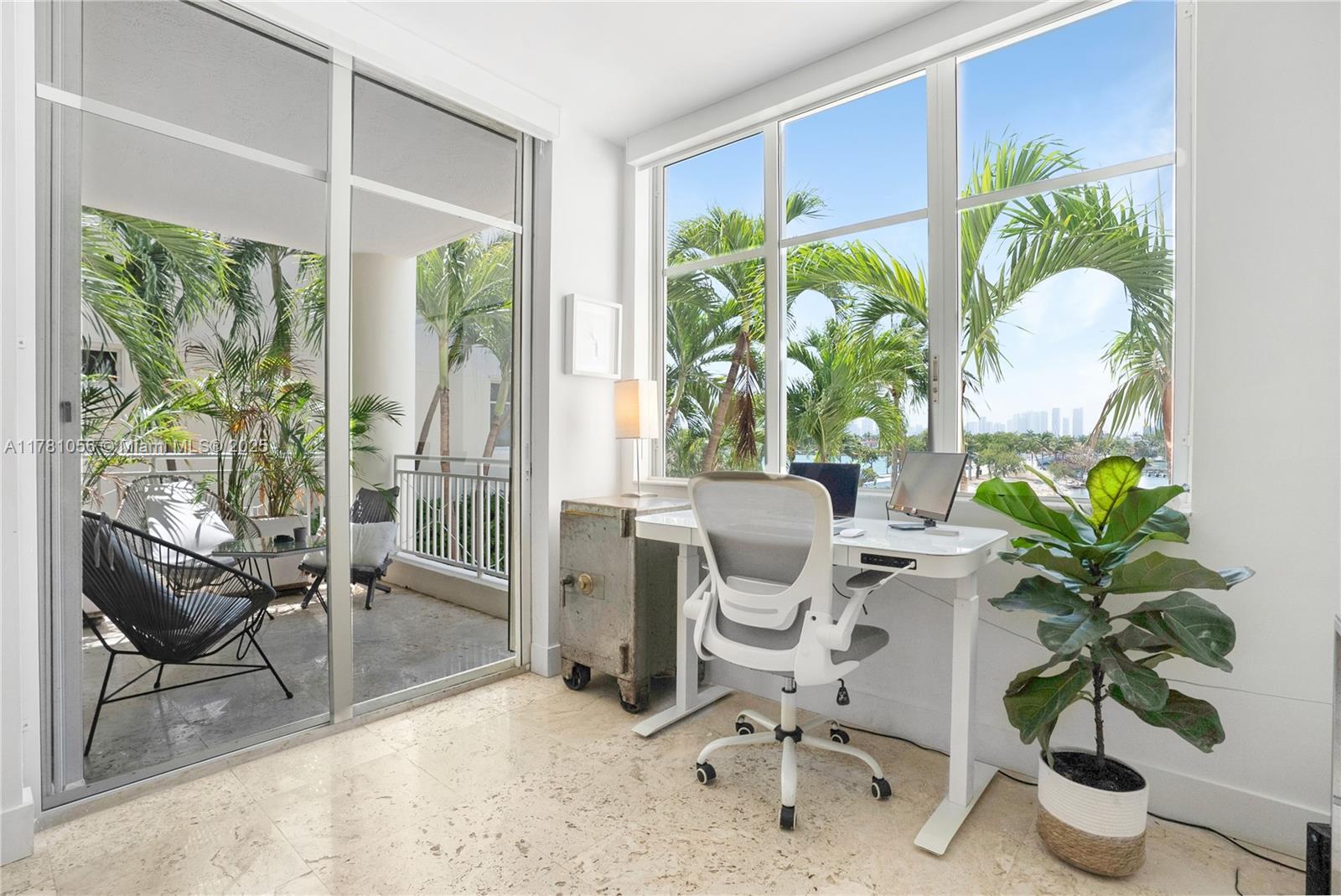 1 Century Lane, Unit 309 Miami Beach, FL 33139 - Photo 8 of 18 a living room filled with furniture