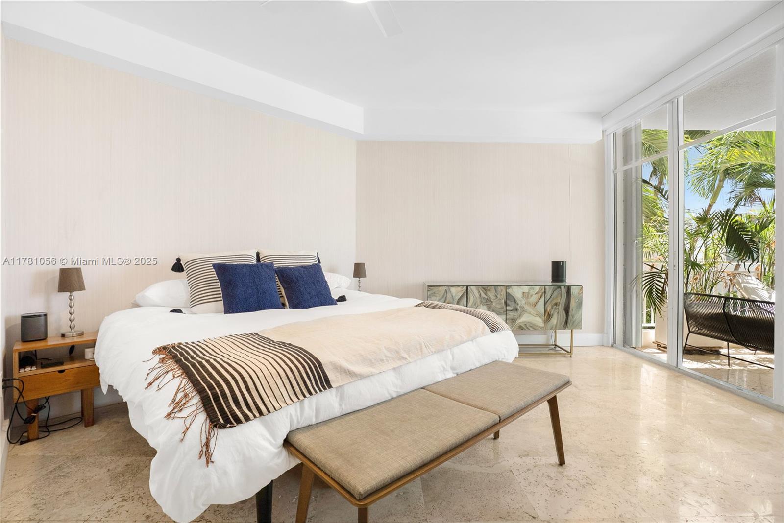 1 Century Lane, Unit 309 Miami Beach, FL 33139 - Photo 10 of 18 a bedroom with a bed and a flat screen tv