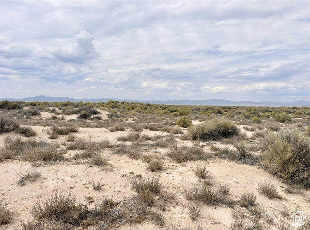 31 South 6th West Beryl, UT 84714 - Photo 4 of 8 View of undeveloped land featuring mountains and a desert landscape