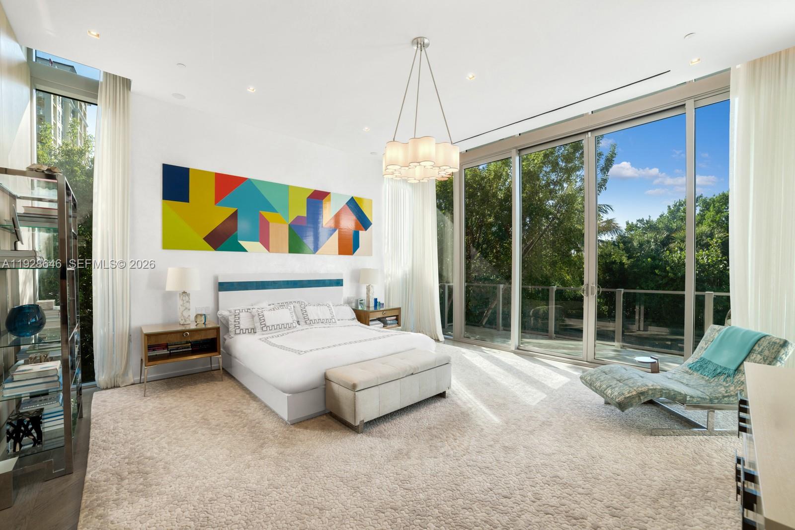 111 Reef Lane Key Biscayne, FL 33149 - Photo 11 of 26 a bedroom with a bed and a window