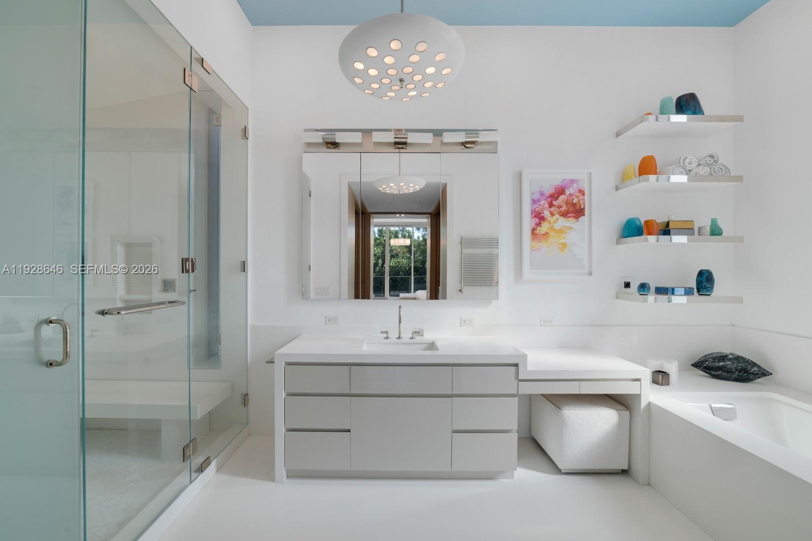 111 Reef Lane Key Biscayne, FL 33149 - Photo 13 of 26 a bathroom with a sink a toilet and shower