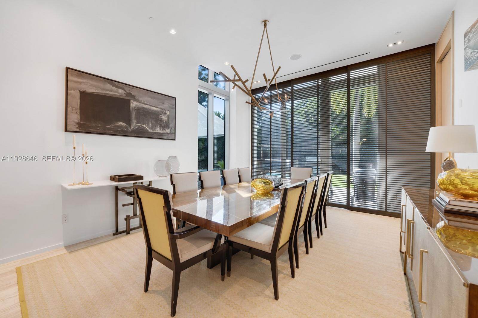 111 Reef Lane Key Biscayne, FL 33149 - Photo 6 of 26 a view of a dining room with furniture window and outside view
