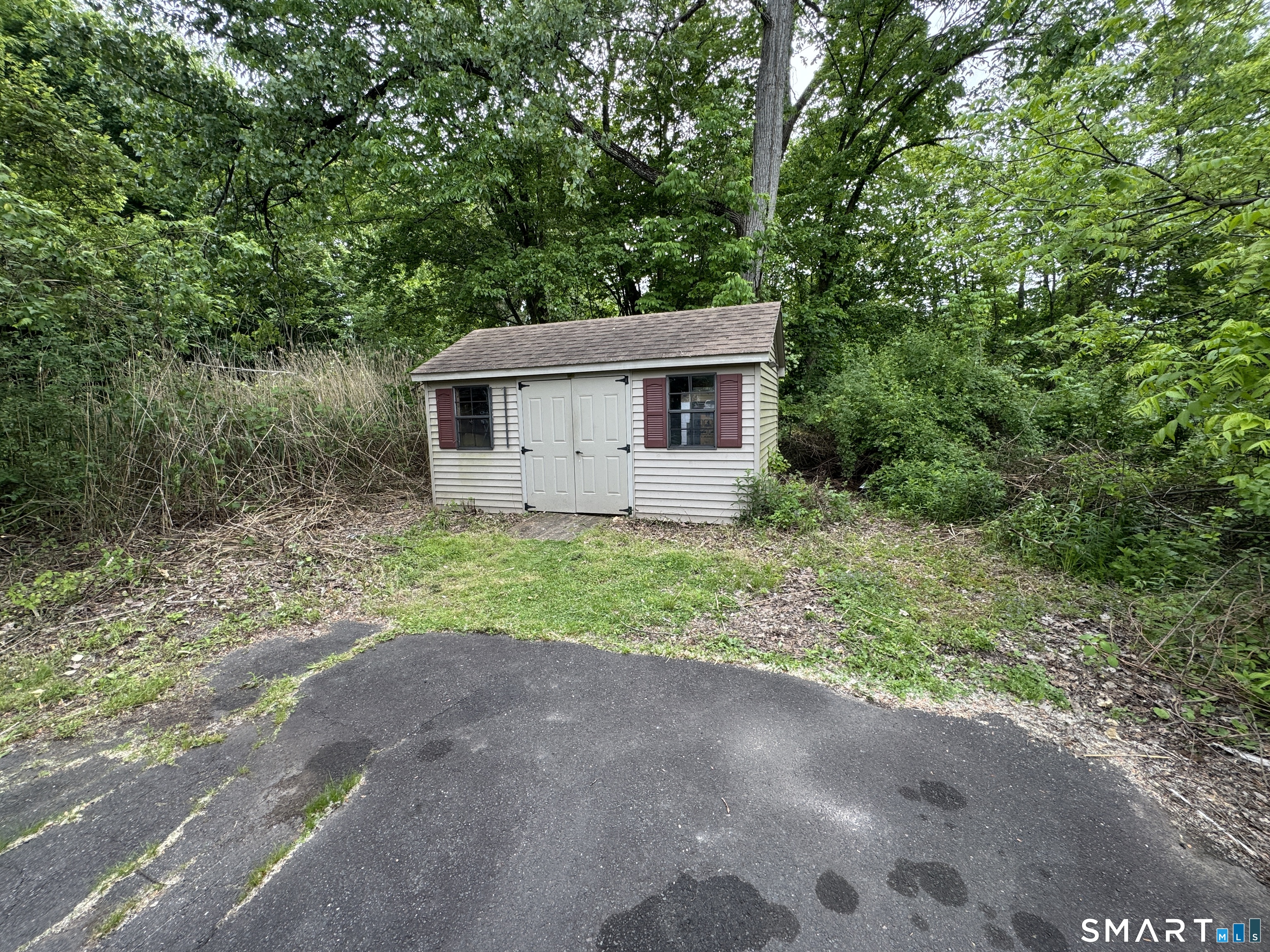 10 Center Street Windsor Locks, CT 06096 - Photo 25 of 25 a view of backyard of house with green space