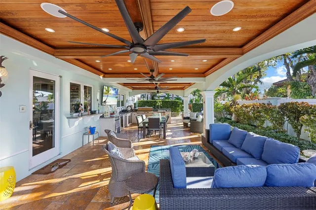 a outdoor living space with patio furniture and a potted plant