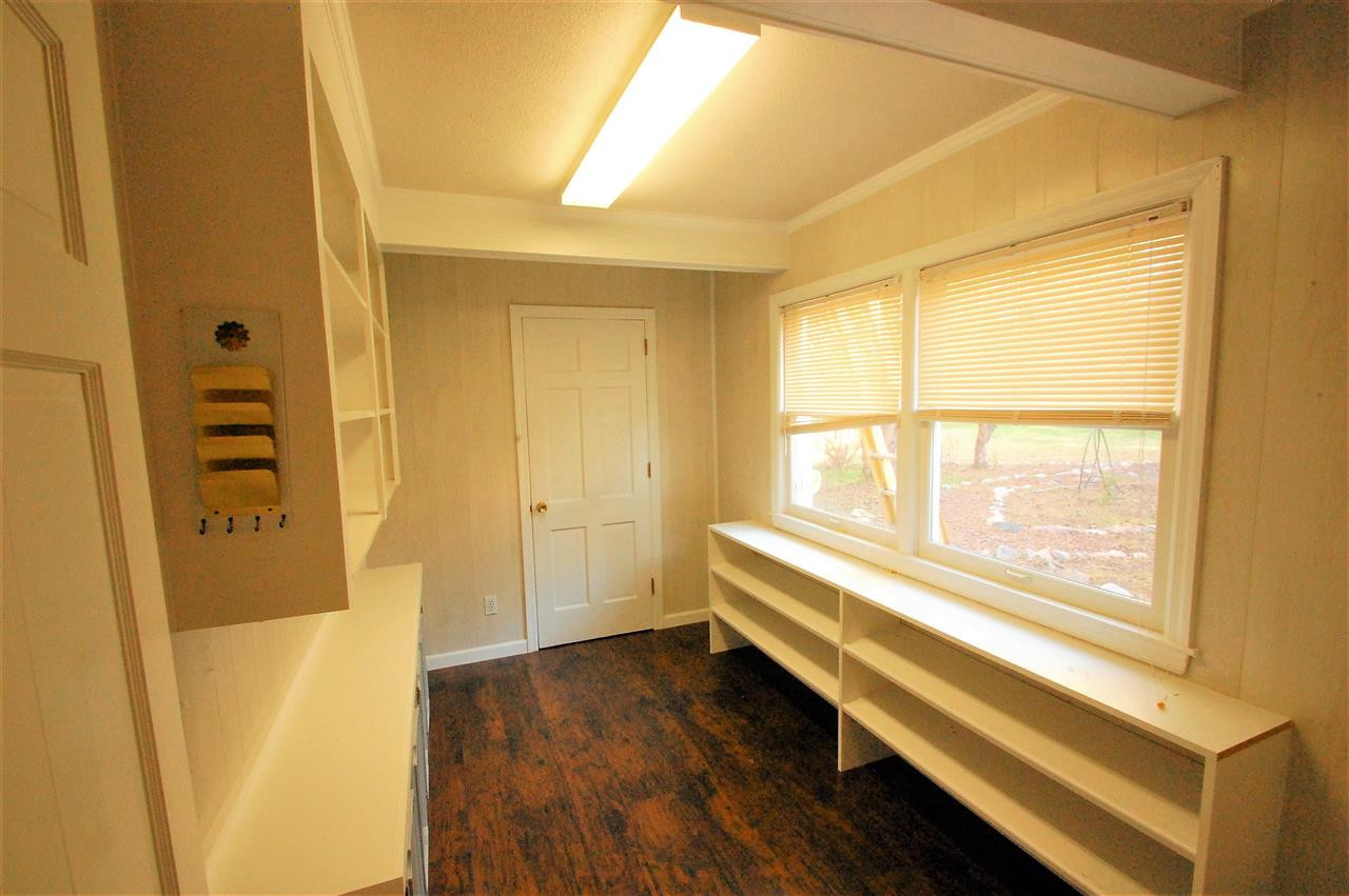 3004 Barnsley Lane Raleigh, NC 27604 - Photo 15 of 25 Just off the side breezeway entrance is a mud room with cedar lined closet. Mud Room