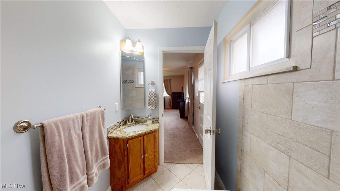 2630 Call Road Stow, OH 44224 - Photo 19 of 37 Bathroom featuring vanity and tile patterned flooring