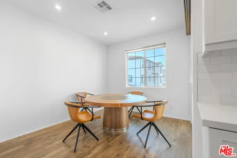 a table and chairs in a room