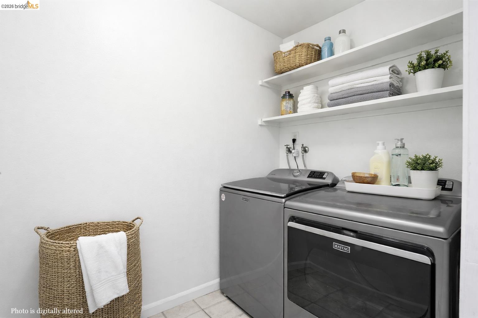 18018 Sahara Road Hayward, CA 94541 - Photo 17 of 20 Laundry room with separate washer and dryer and light tile patterned floors