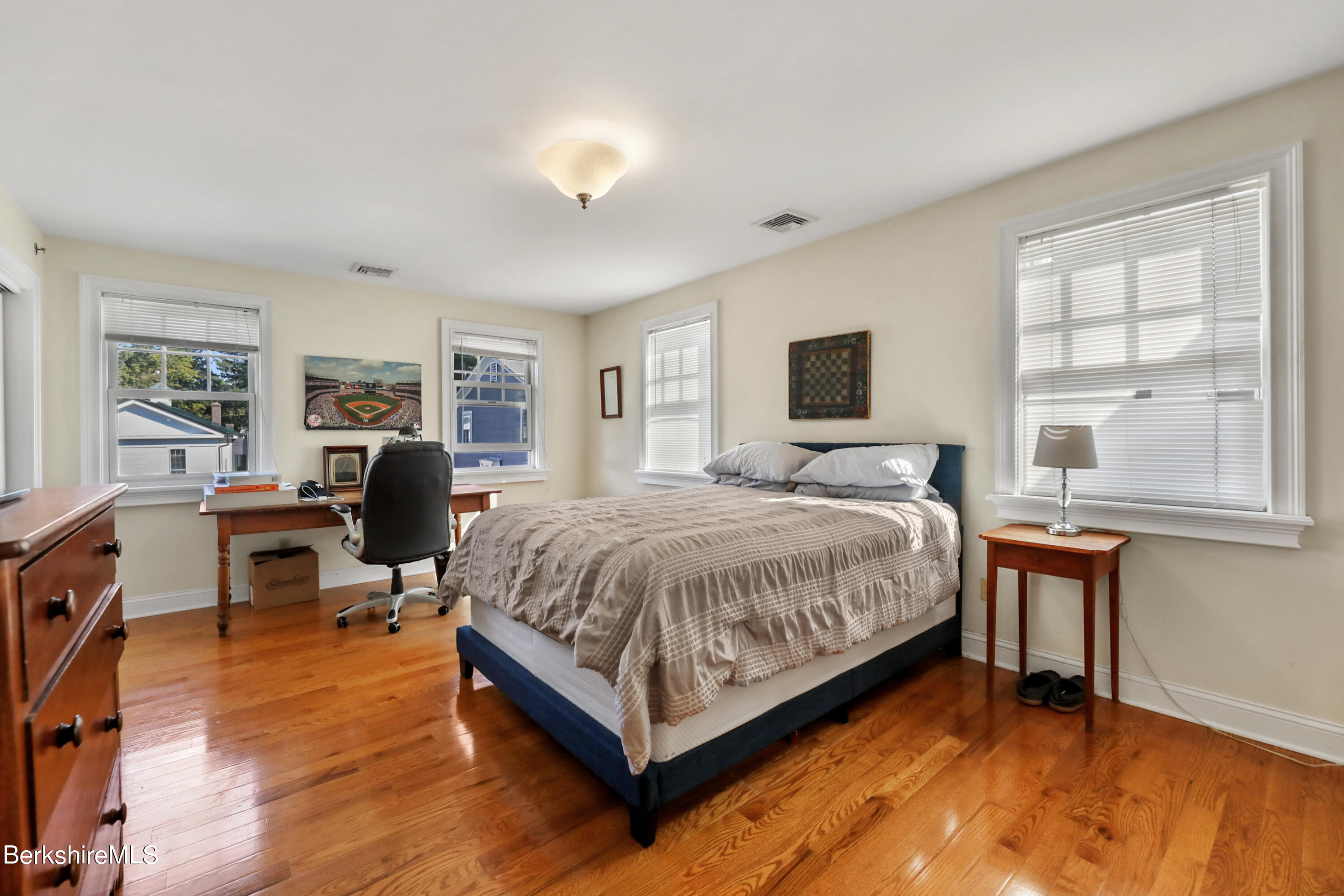29 Main Street West Stockbridge, MA 01266 - Photo 42 of 51 a spacious bedroom with a bed and wooden floor