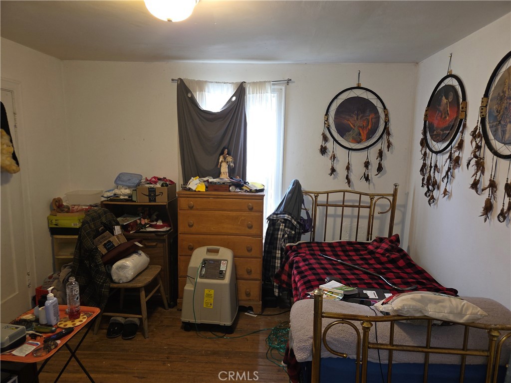 300 Chestnut Avenue Red Bluff, CA 96080 - Photo 20 of 48 a bedroom with a bunk bed and a dresser in it