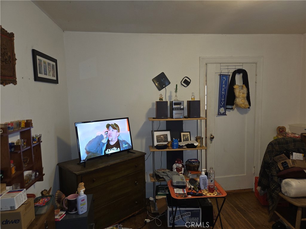 300 Chestnut Avenue Red Bluff, CA 96080 - Photo 21 of 48 a living room with furniture and a flat screen tv