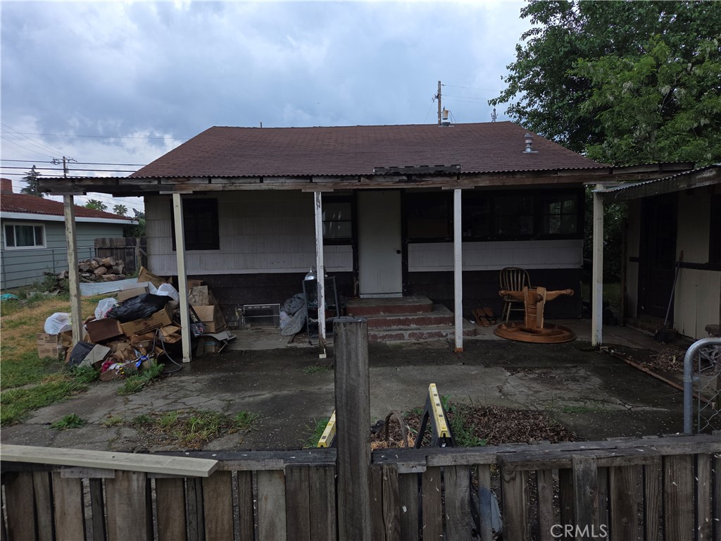 300 Chestnut Avenue Red Bluff, CA 96080 - Photo 27 of 48 a view of a wooden house with chairs and table