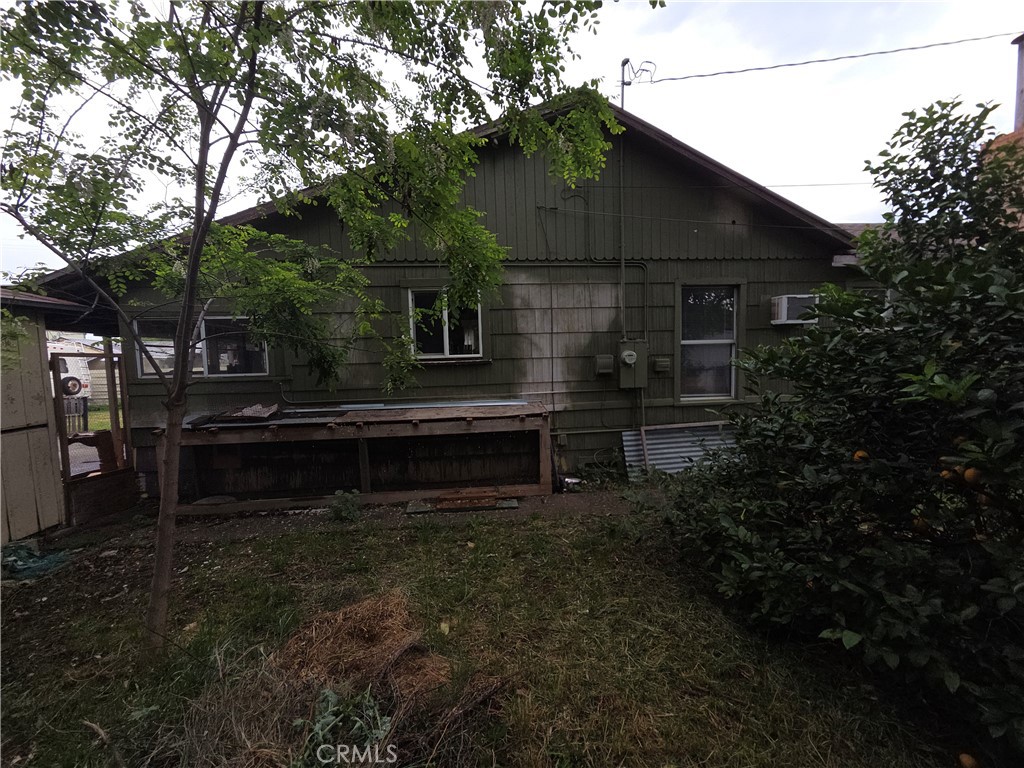 300 Chestnut Avenue Red Bluff, CA 96080 - Photo 28 of 48 a backyard of a house with lots of green space