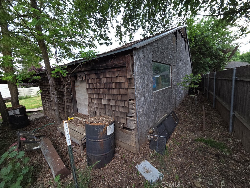300 Chestnut Avenue Red Bluff, CA 96080 - Photo 32 of 48 a backyard of house with a seating space