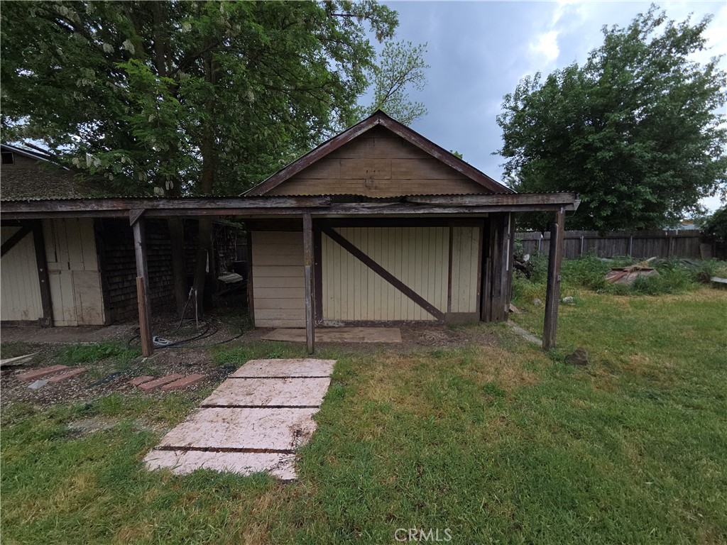 300 Chestnut Avenue Red Bluff, CA 96080 - Photo 36 of 48 a house with trees in the background