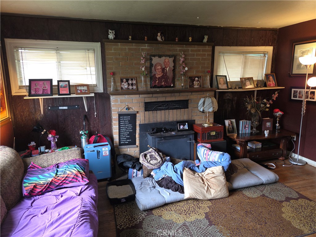 300 Chestnut Avenue Red Bluff, CA 96080 - Photo 4 of 48 a living room with furniture and a fireplace