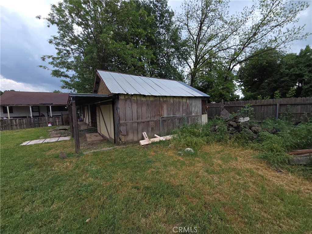 300 Chestnut Avenue Red Bluff, CA 96080 - Photo 41 of 48 a backyard of a house with lots of green space