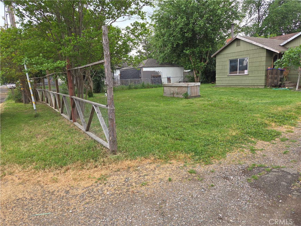 300 Chestnut Avenue Red Bluff, CA 96080 - Photo 47 of 48 a view of a house with backyard and a tree