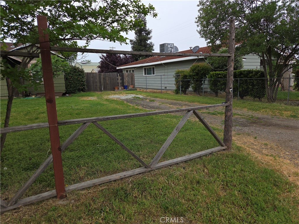 300 Chestnut Avenue Red Bluff, CA 96080 - Photo 48 of 48 a view of a house with backyard and a tree