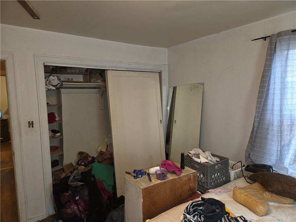 300 Chestnut Avenue Red Bluff, CA 96080 - Photo 9 of 48 a living room with furniture and a gate