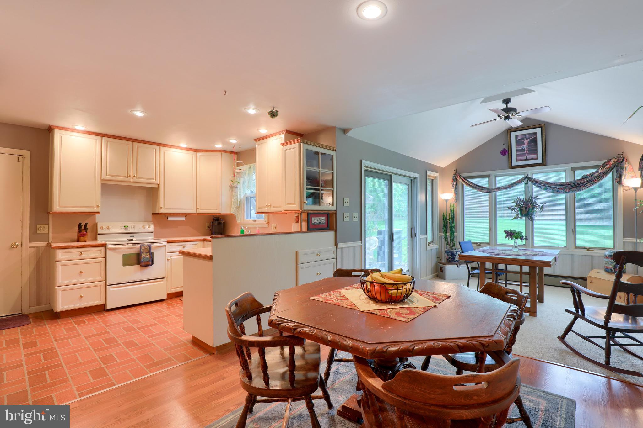 1524 Loop Road Manheim, PA 17545 - Photo 16 of 37 Dining Area, Kitchen & Sun Room