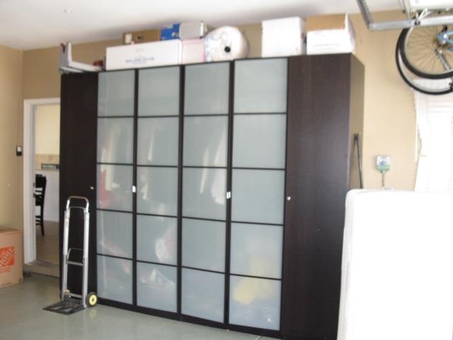 26017 Matlin Road Ramona, CA 92065 - Photo 24 of 25 CUSTOM CABINETS IN GARAGE
