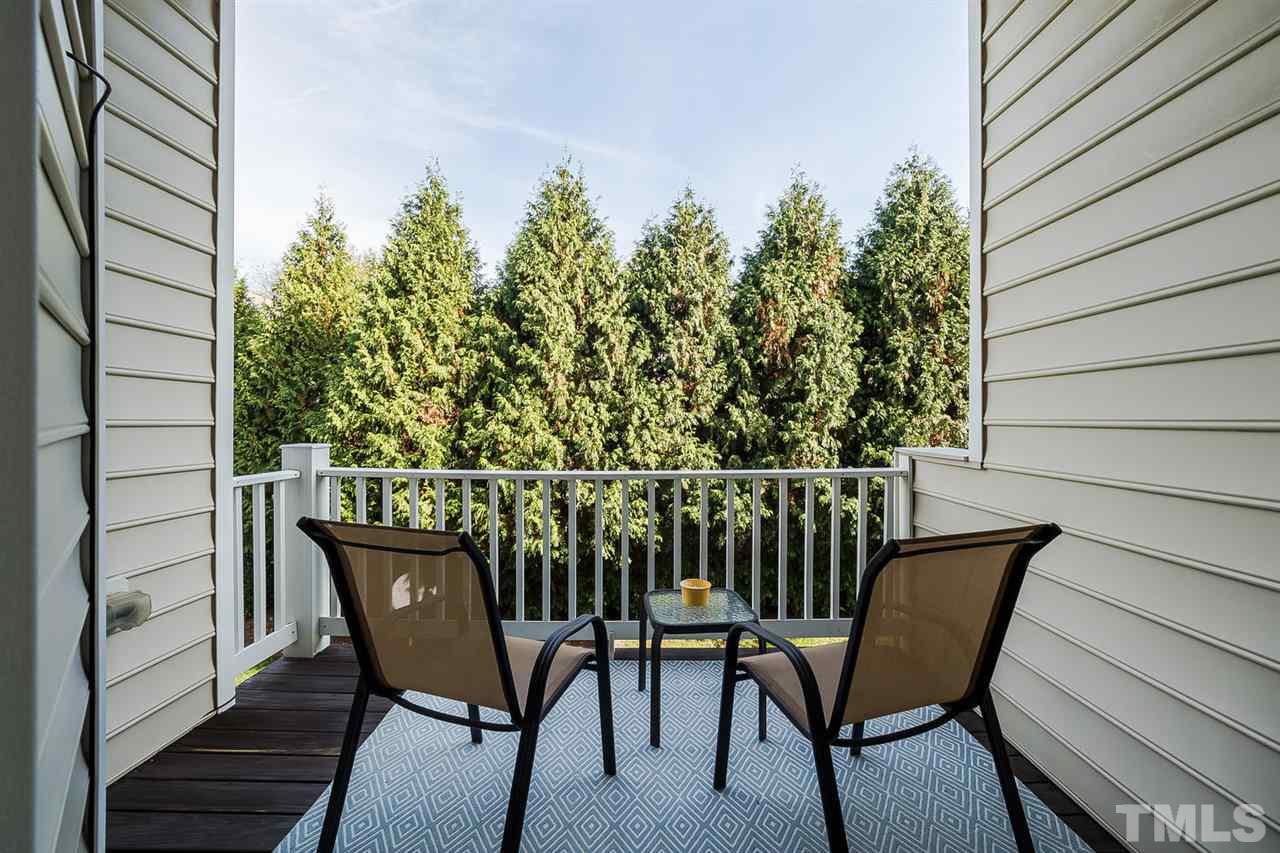 5708 Cameo Glass Way Raleigh, NC 27612 - Photo 20 of 23 a view of a chairs and table in the balcony