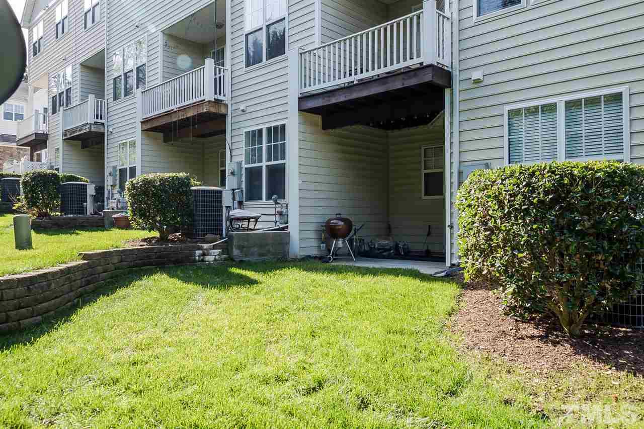 5708 Cameo Glass Way Raleigh, NC 27612 - Photo 23 of 23 a view of a house with backyard and sitting area
