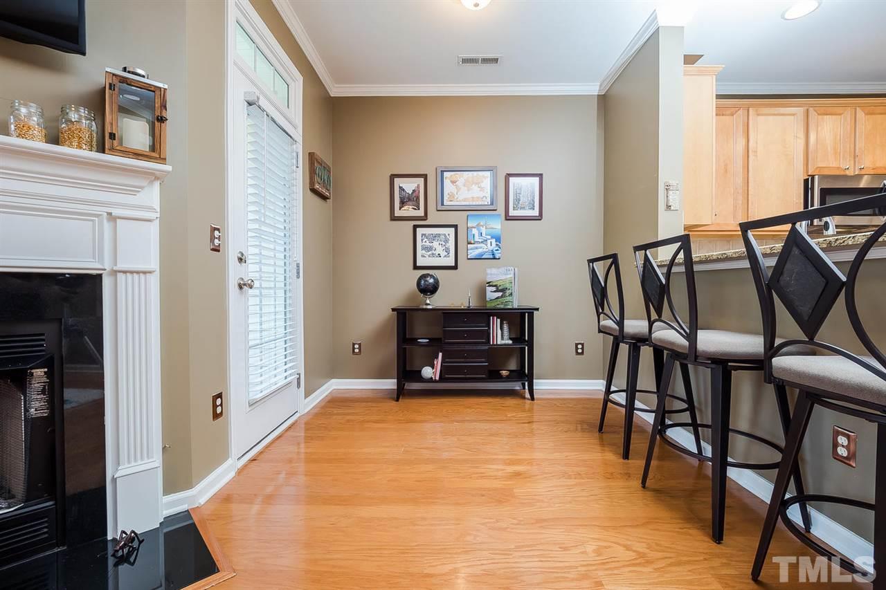 5708 Cameo Glass Way Raleigh, NC 27612 - Photo 9 of 23 a room with furniture and a wooden floor