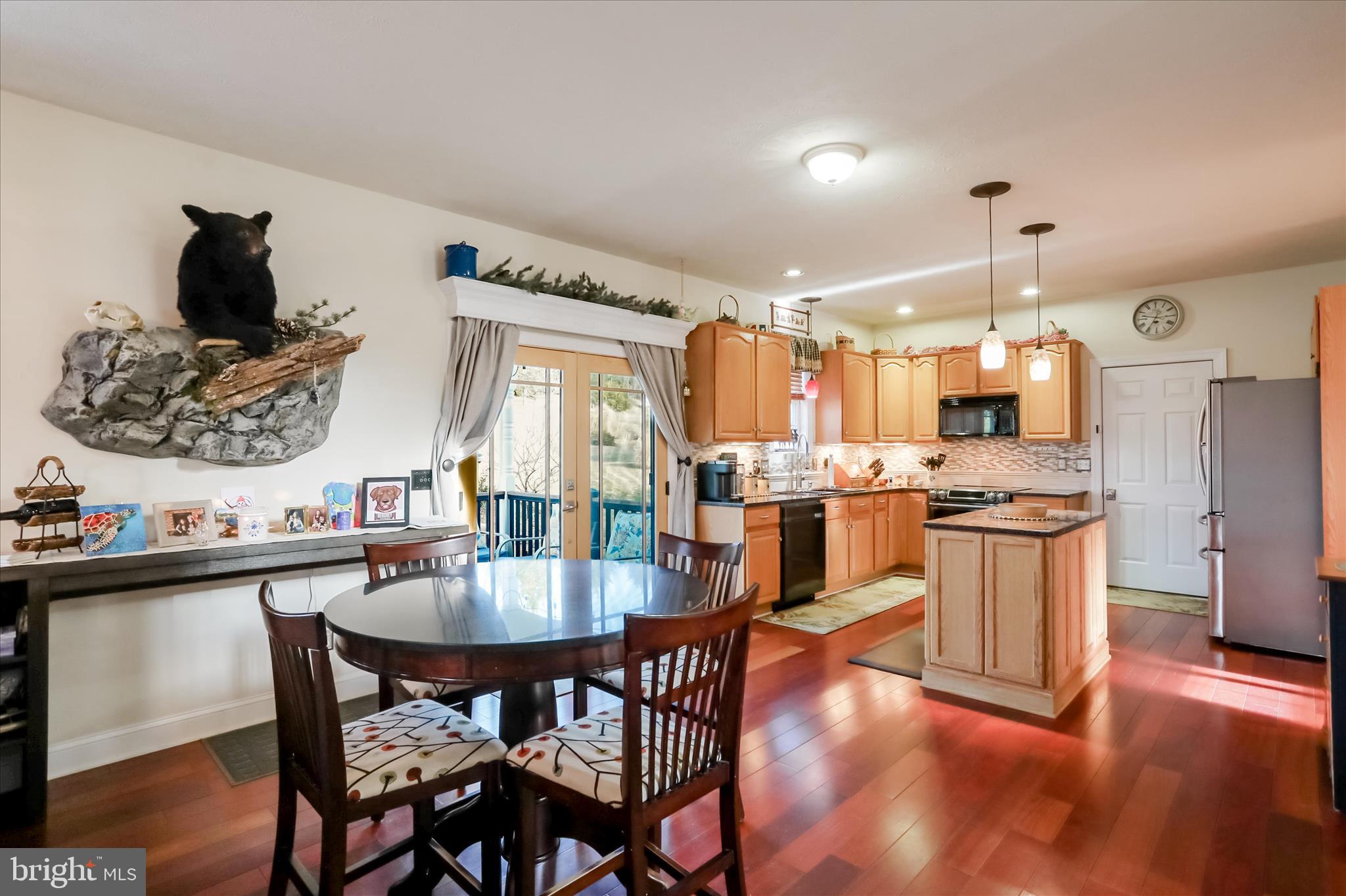 2747 Timber Rdg Road Capon Bridge, WV 26711 - Photo 56 of 97 Breakfast Table and Family Room