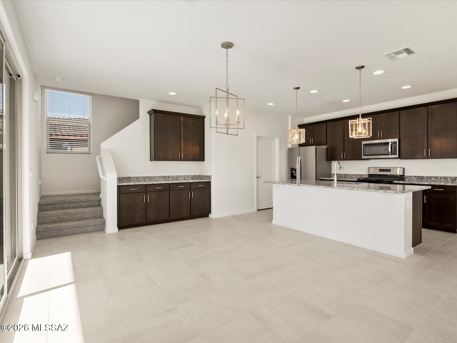 5160 West Bowen House Road Tucson, AZ 85757 - Photo 6 of 15 Photo is not of the actual home, but is an inspirational photo of builder’s model home and may depict options, furnishings, and/or decorator features that are not included