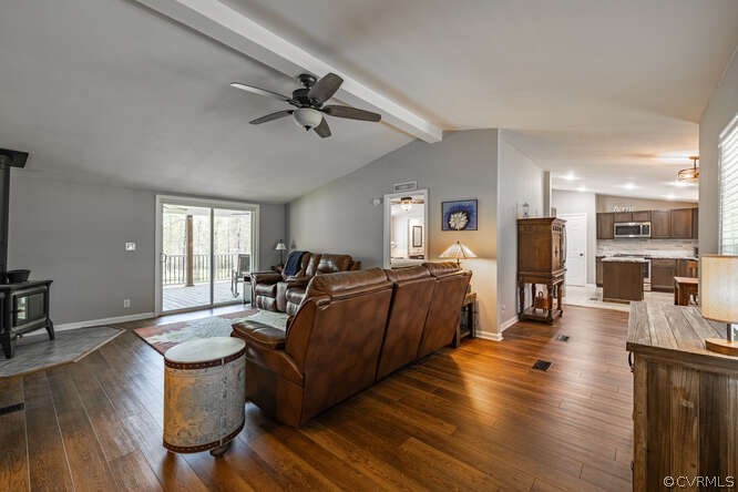 1680 Battes Road Green Bay, VA 23942 - Photo 11 of 38 a living room with furniture and a wooden floor