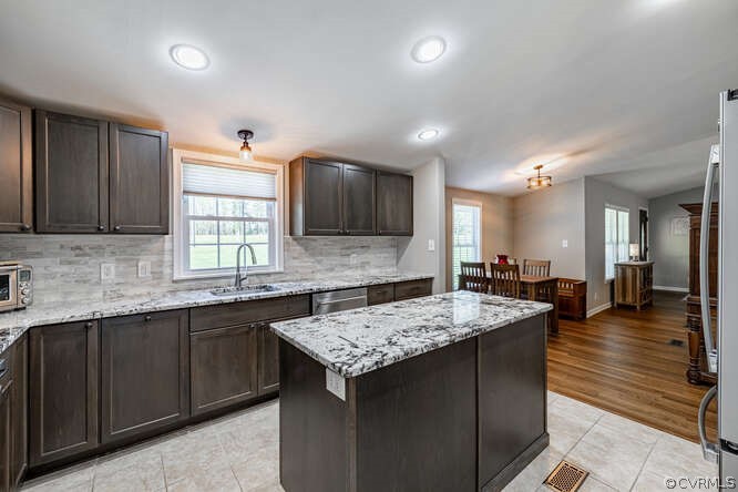 1680 Battes Road Green Bay, VA 23942 - Photo 7 of 38 a kitchen with a stove sink and cabinets